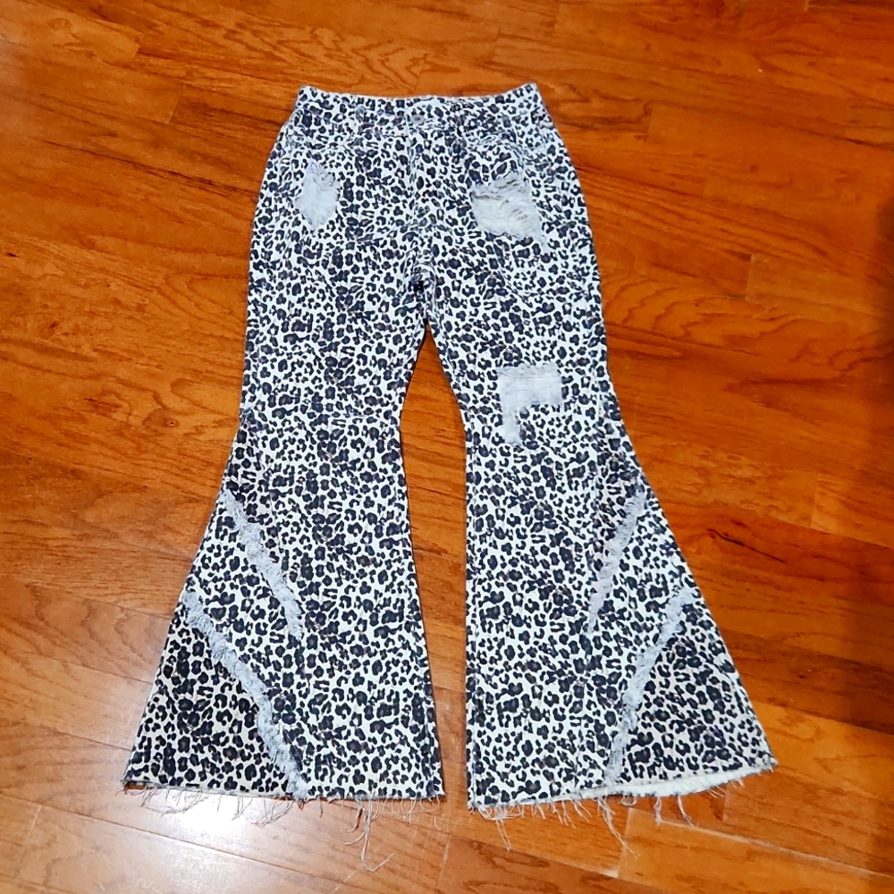 Distressed denim‎ leopard flare pants